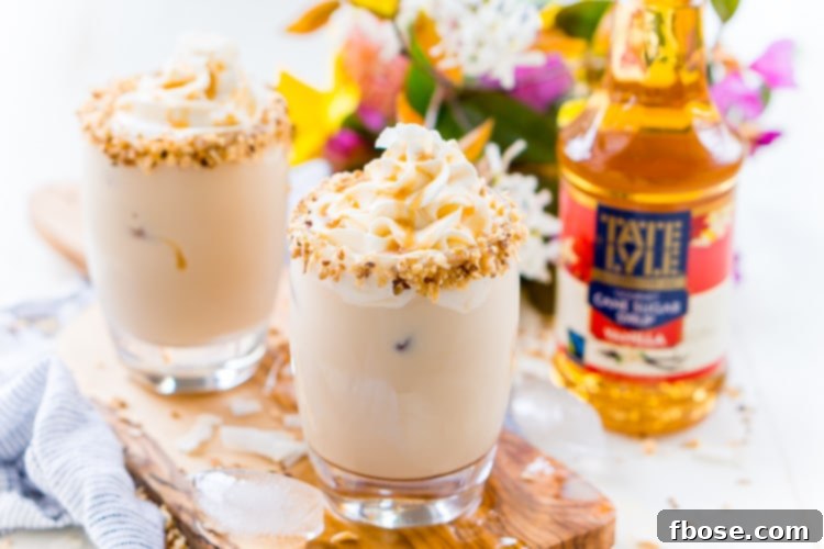 Close-up of a German Chocolate Cocktail, showcasing its creamy texture and garnished rim, highlighting the blend of coconut, vanilla, and chocolate flavors.