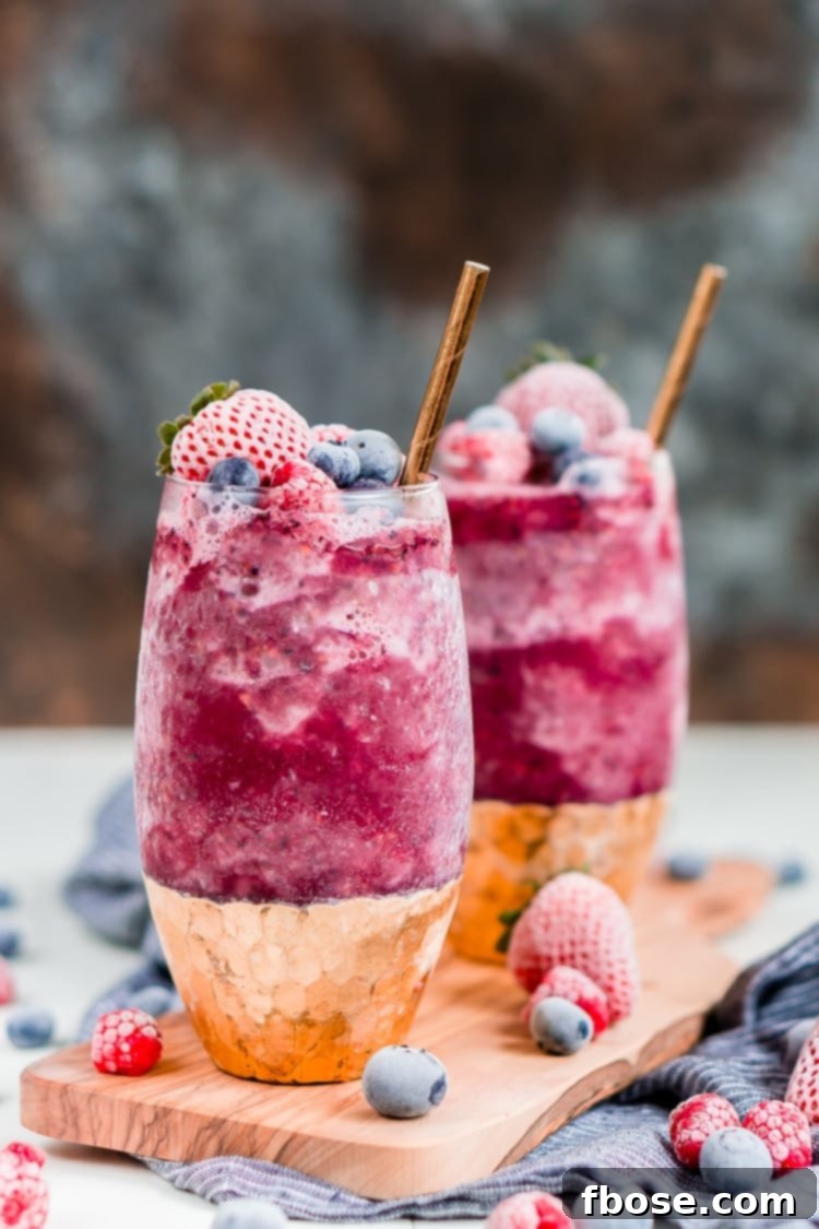 Sangria Slushies are loaded with berry and citrus flavors and Red Moscato making it the perfect frozen cocktail for summer!