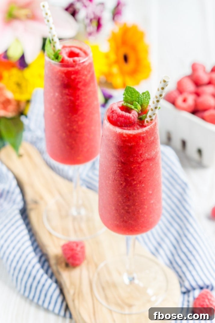 Raspberry Champagne Slushy Recipe 2 Refreshing Raspberry Champagne Slushies, perfect for summer parties.