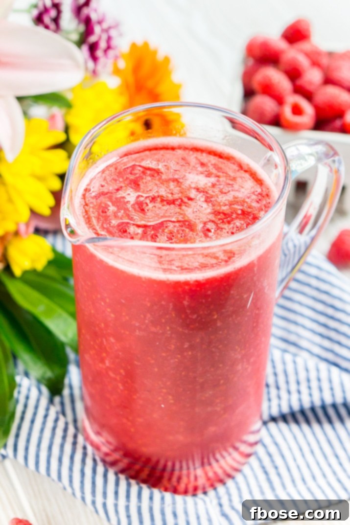 Raspberry Champagne Slushy Recipe 4 Three glasses of Raspberry Champagne Slushies, ready to be served.