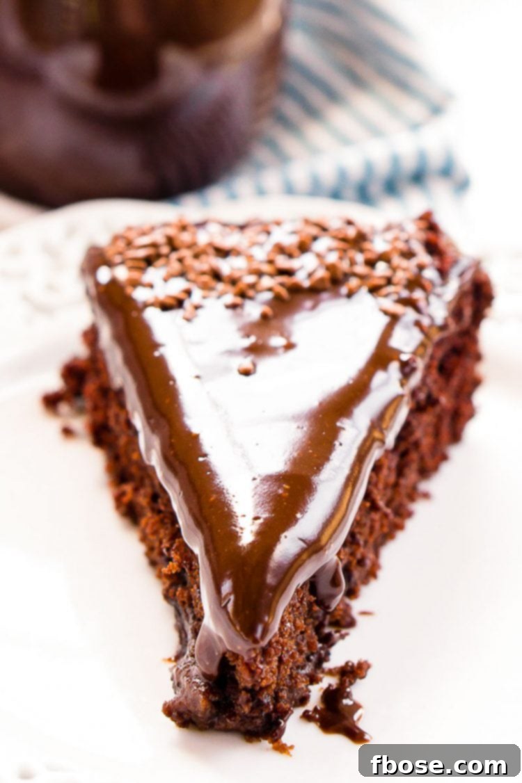 Close up photo of a slice of chocolate crazy cake.
