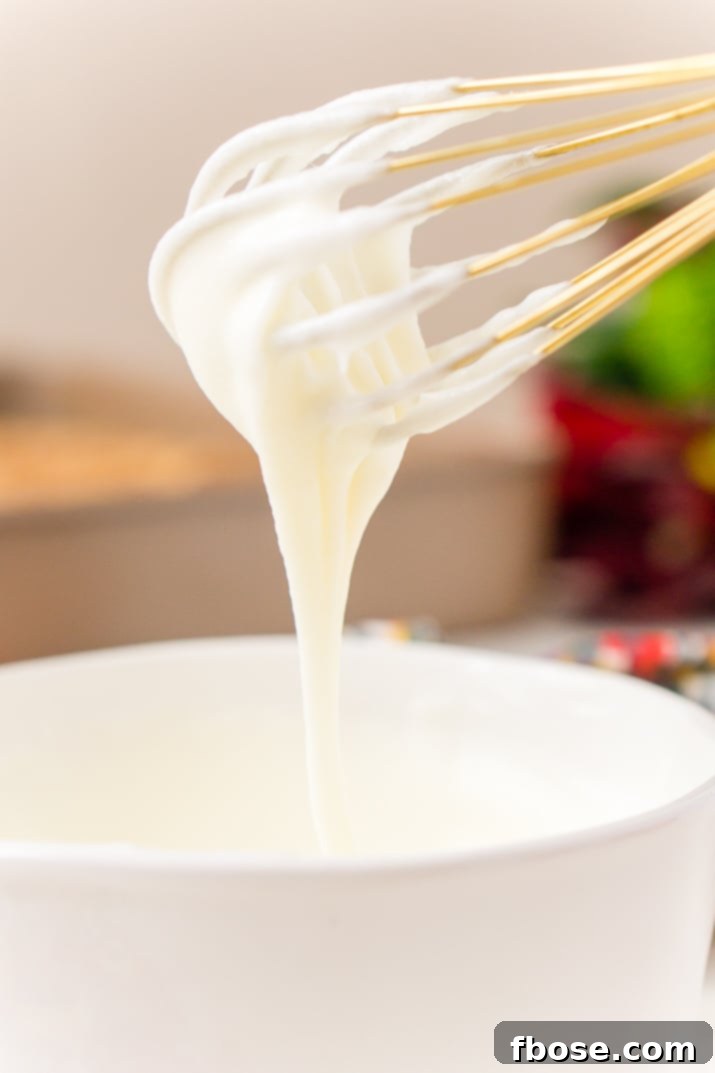 This really is the best homemade vanilla icing recipe! It's perfect for slathering on cinnamon rolls and drizzling over cakes and cookies!