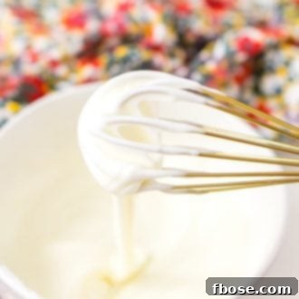 This really is the best homemade vanilla icing recipe! It's perfect for slathering on cinnamon rolls and drizzling over cakes and cookies!