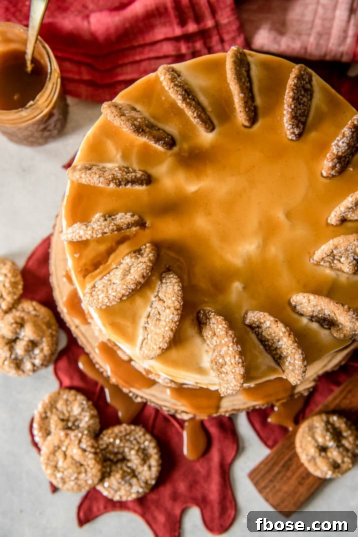 Spiced Bourbon Caramel Decadence 4 Top view of a freshly baked Bourbon Caramel Spice Cake, showcasing the rich caramel drizzle and gingersnap garnish.