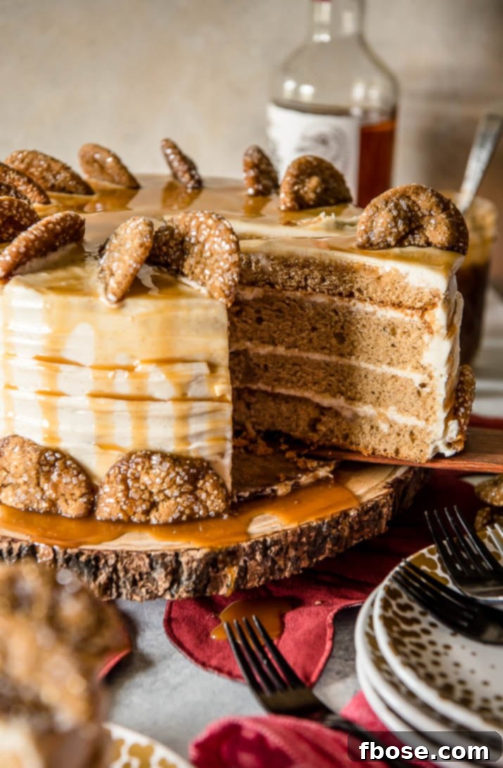 Spiced Bourbon Caramel Decadence 6 Another angled view of the Bourbon Caramel Spice Cake, highlighting its height and decadent frosting, with more gingersnaps.