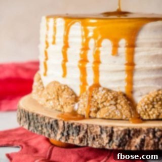 Spiced Bourbon Caramel Decadence 7 A full shot of the Boozy Bourbon Caramel Spice Cake, garnished with gingersnaps and drizzled caramel.
