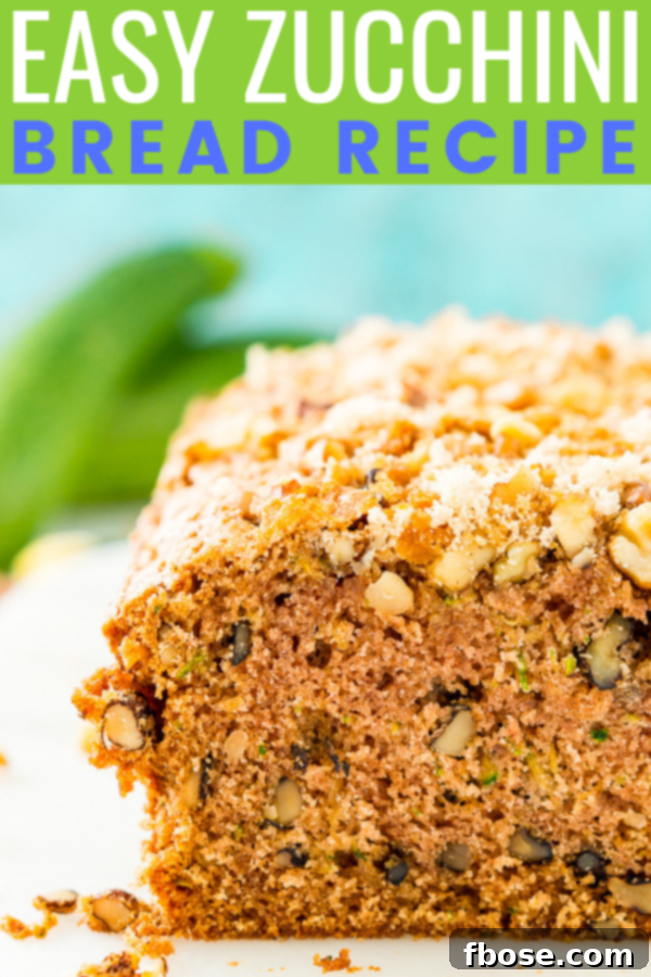 A beautifully sliced Zucchini Bread showing its moist texture