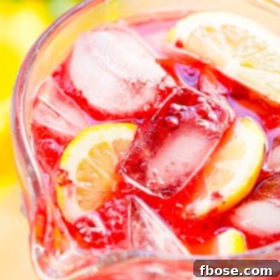 This Sparkling Raspberry Lemonade is a delicious and refreshing fruity drink that's made with raspberries, lemons, simple syrup, and club soda.