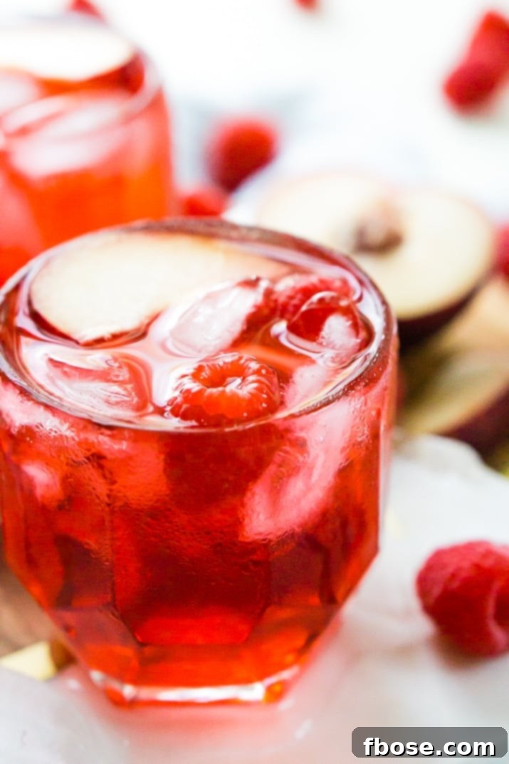 Easy Cocktail Recipes - Red Russian, showing various garnishes like cherries and orange slices