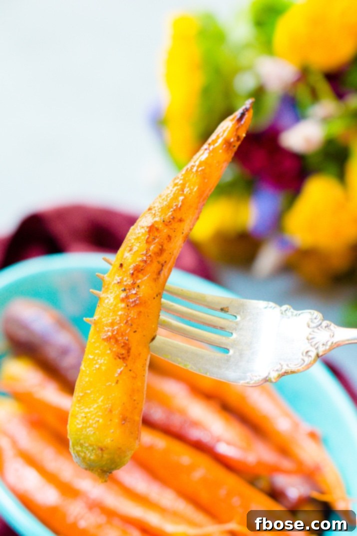 Platter of Orange Braised Carrots, glistening with a vibrant glaze.