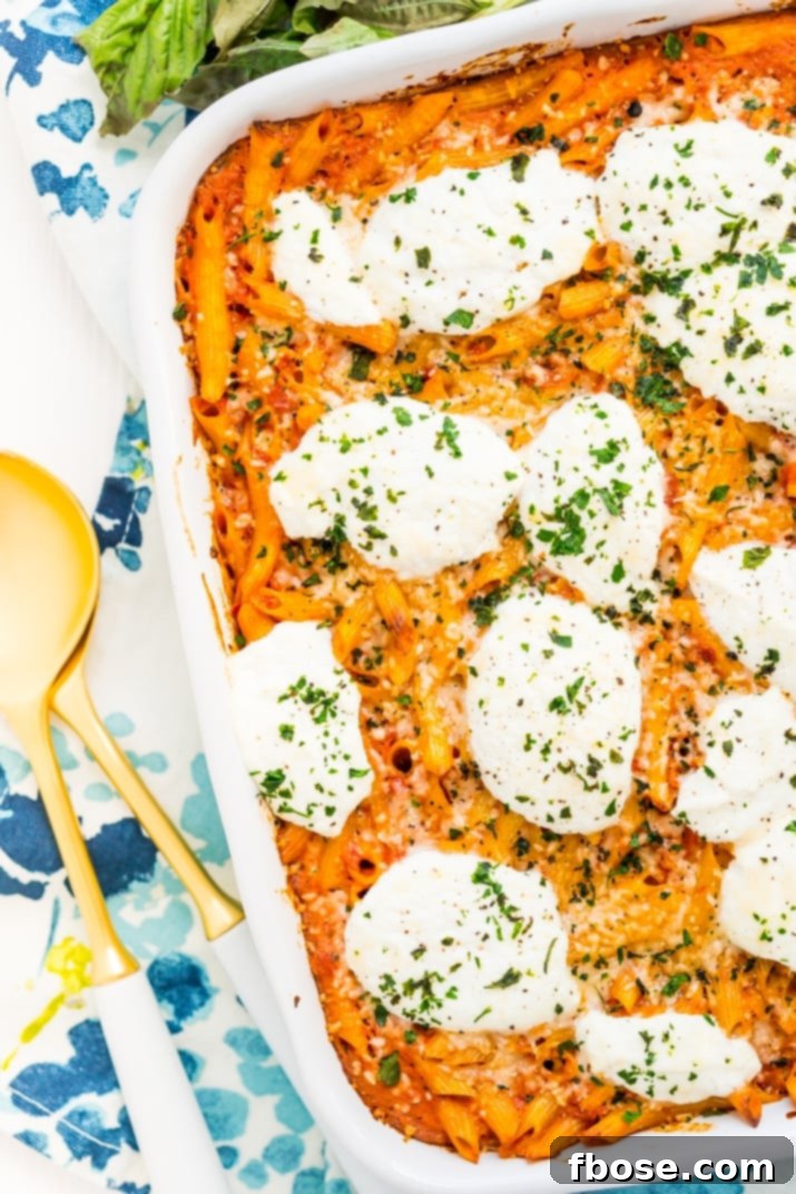 A vibrant, easy one-pan Ricotta Pasta Bake, featuring golden-brown ricotta and a rich tomato sauce with penne, prepared in just 5 minutes prep time and baked in 1 hour.