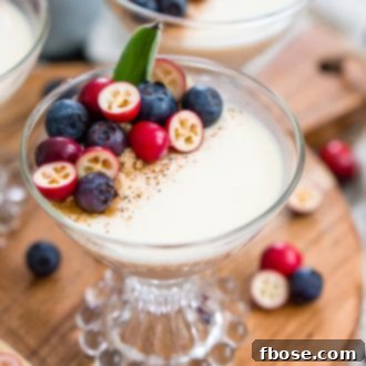 This Maple Panna Cotta is a light and creamy fall dessert that's simple to make and impressive to serve holiday dinner guests!