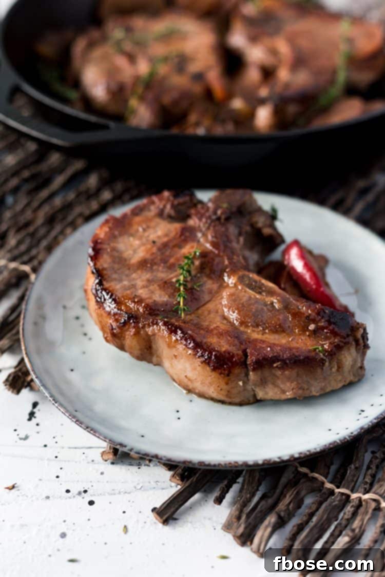 Baked Pork Chops with Apples, Shallots, and Red Wine.