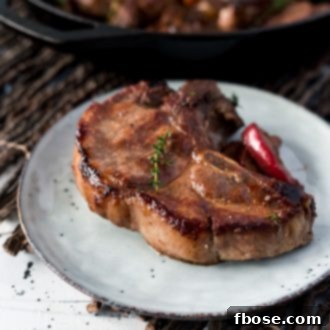 Baked Pork Chops with Apples, Shallots, and Red Wine.