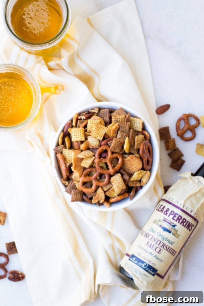 Crunchy, buttery and full of flavor this easy crunchy party mix is the perfect snack for holiday entertaining!