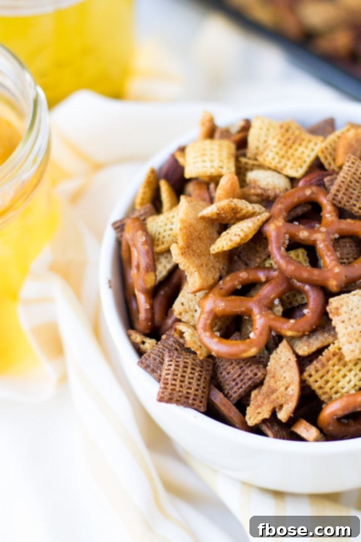 Crunchy, buttery and full of flavor this easy crunchy party mix is the perfect snack for holiday entertaining!