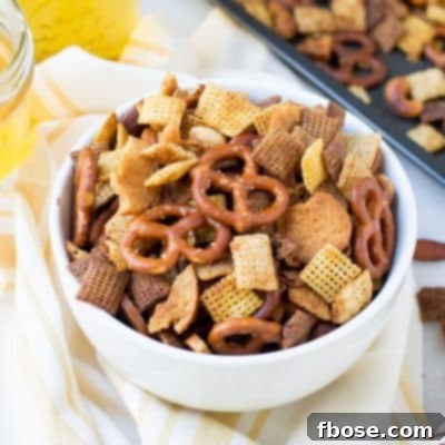 Crunchy, buttery and full of flavor this easy crunchy party mix is the perfect snack for holiday entertaining!