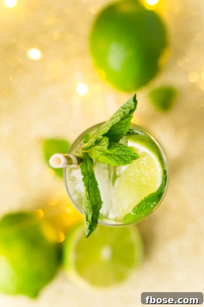 Step-by-step preparation of a mojito, showcasing the muddling process with fresh mint and lime.