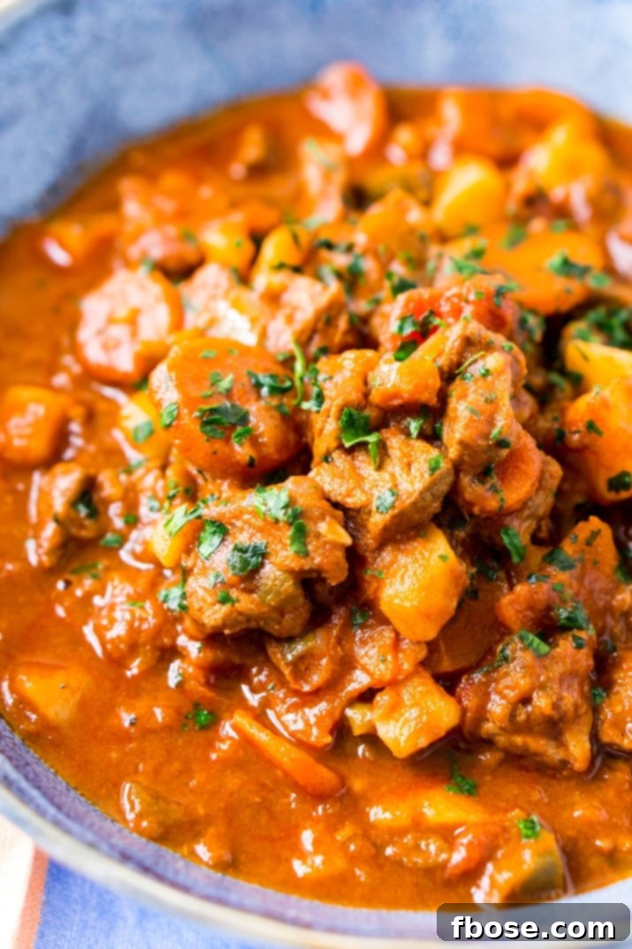 Authentic Hungarian Goulash 2 Rich and hearty Hungarian Goulash stew with beef, carrots, and potatoes