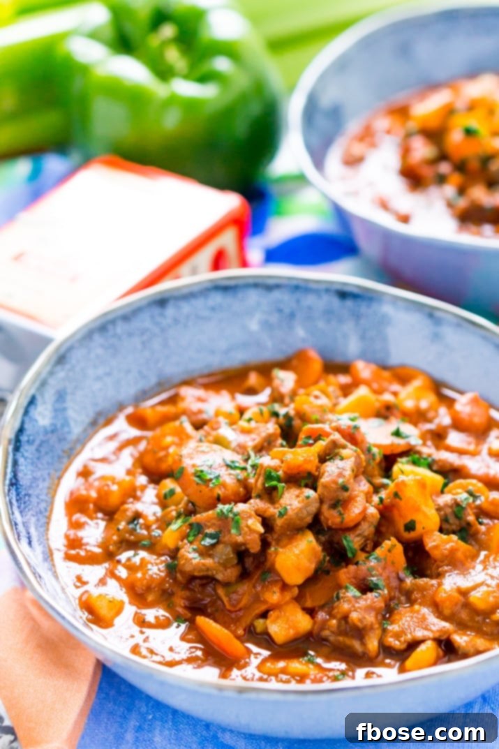 Authentic Hungarian Goulash 4 Cooking Hungarian Goulash in a Dutch oven with fresh ingredients