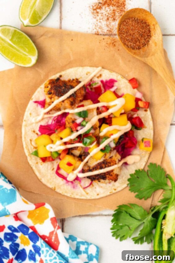 Overhead photo of blackened fish tacos on a piece of parchment.