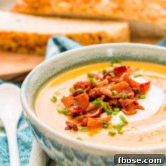 This Sweet Potato Soup is a creamy and filling dinner recipe that's made on the stovetop with onion, sweet potatoes, cream, stock, garlic, and spices! A comforting soup recipe for special occasions or chilly nights!