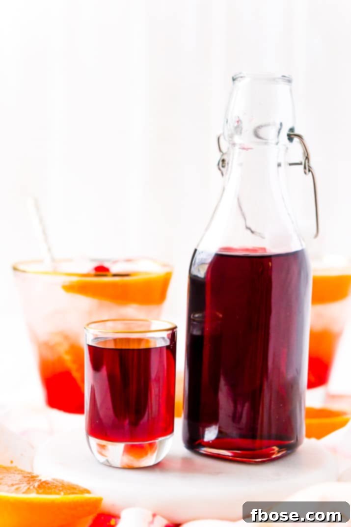 This recipe for Grenadine Syrup allows you to make this fresh and flavorful cocktail syrup right at home. Made with pomegranate juice, sugar, and lemon juice, it's ready to use in about 30 minutes and tastes so much better than that store-bought stuff!