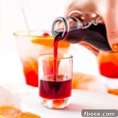 This recipe for Grenadine Syrup allows you to make this fresh and flavorful cocktail syrup right at home. Made with pomegranate juice, sugar, and lemon juice, it's ready to use in about 30 minutes and tastes so much better than that store-bought stuff!