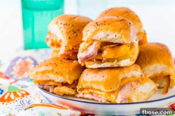 A festive game day spread featuring Ham and Cheese Sliders, perfect for entertaining.