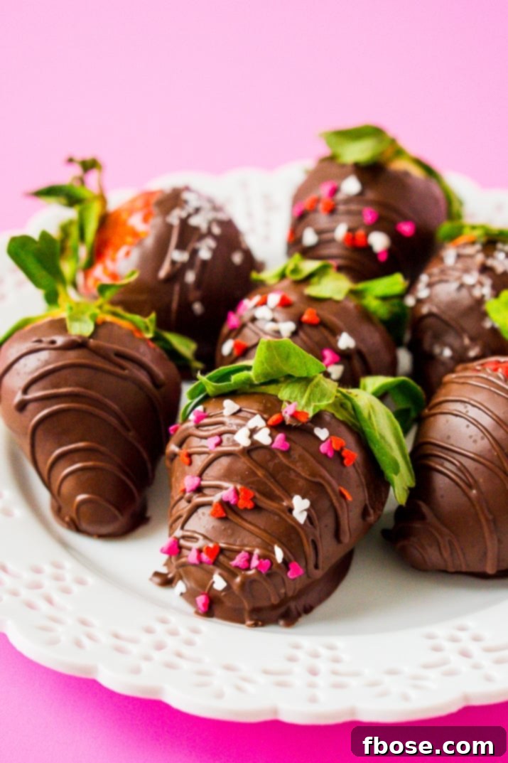 The ultimate recipe for homemade chocolate covered strawberries, featuring fresh berries dipped in smooth, rich chocolate perfect for Valentine's Day and special events.