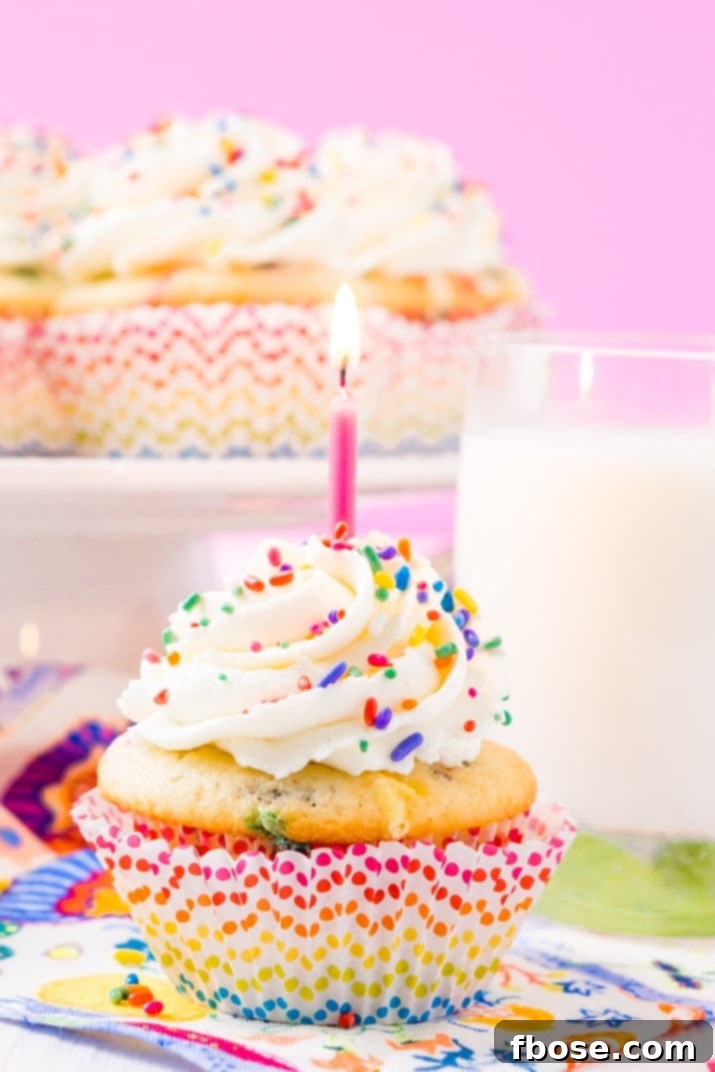 These Birthday Cupcakes are a delicious and fluffy vanilla almond cake that's loaded with sprinkles and topped with an easy and addictive whipped frosting!