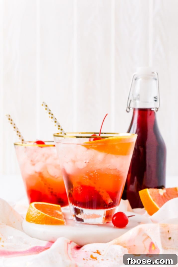 Shirley Temple Drink with bottle of granadine