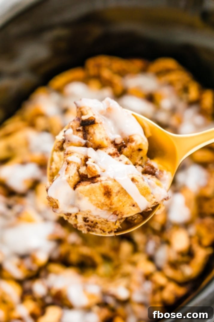 Scoop of cinnamon roll casserole