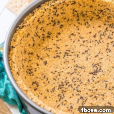 This is the Best Graham Cracker Crust Recipe for all of your desserts both baked and no-bake! This crust is made with graham crackers, butter, sugar, and an ingredient that makes it better than all the rest! Deep dish and standard measurements included!