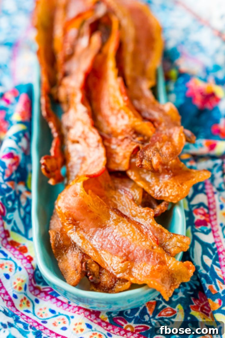 Foolproof Oven Bacon 2 Baking Bacon in the oven is an easy method for cooking perfect bacon, the best part is, no mess! Enjoy the bacon immediately or save for other recipes!