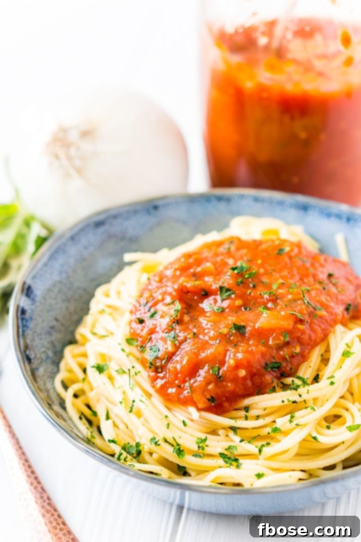 Pasta pomodoro sauce in blue bowl pasta pomodoro sauce in blue bowl