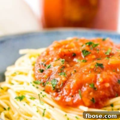 Pomodoro Sauce is a thick and flavorful Italian pasta sauce recipe made with tomatoes, onion, garlic, basil, and red pepper flakes. An easy and delicious homemade sauce the whole family will love!