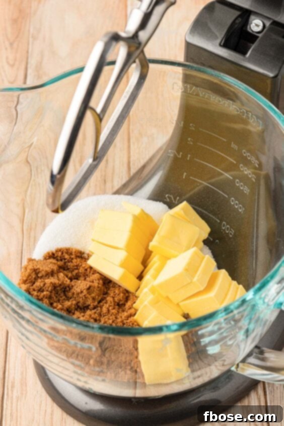 The Definitive Chocolate Chip Cookie 11 Butter and sugars ready to be creamed in a mixing bowl.