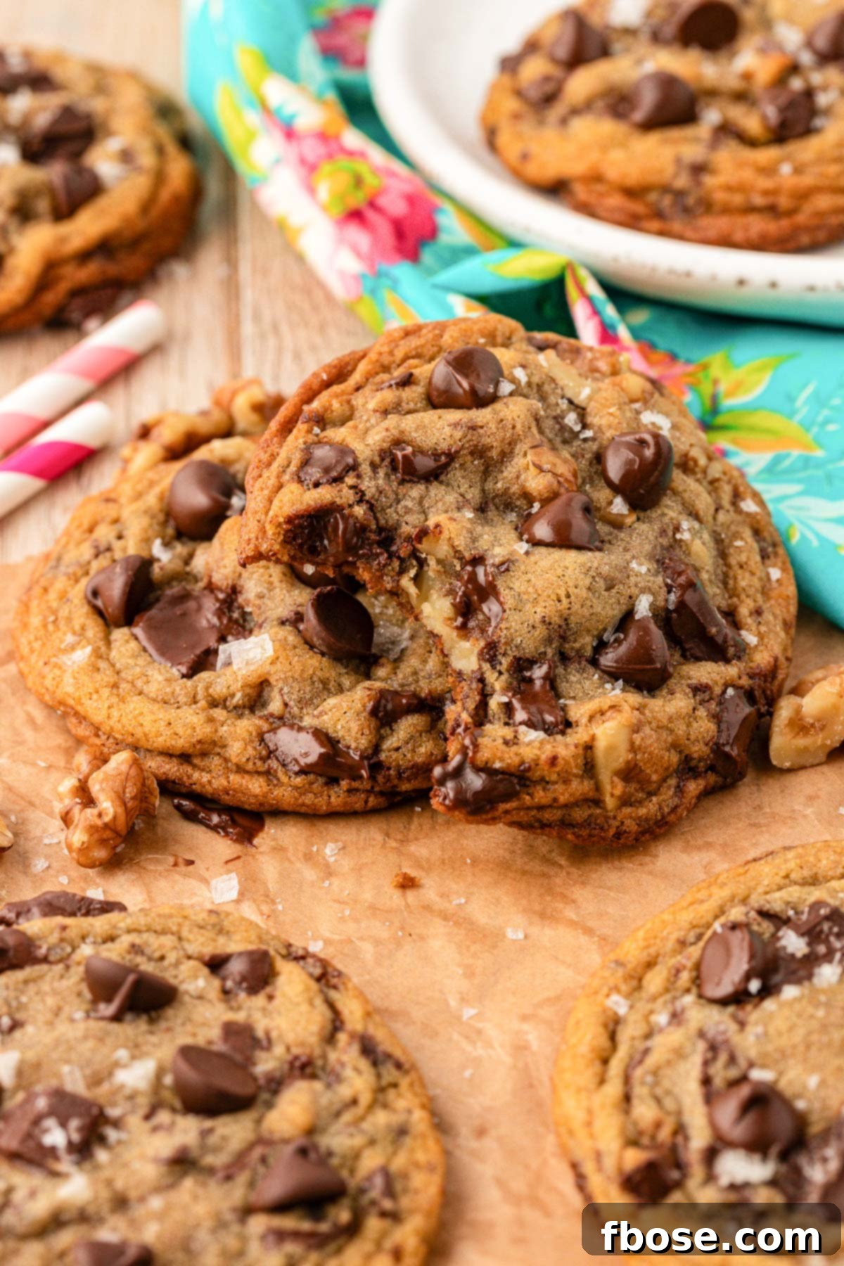 The Definitive Chocolate Chip Cookie 8 Toll House Copycat cookies on a table.