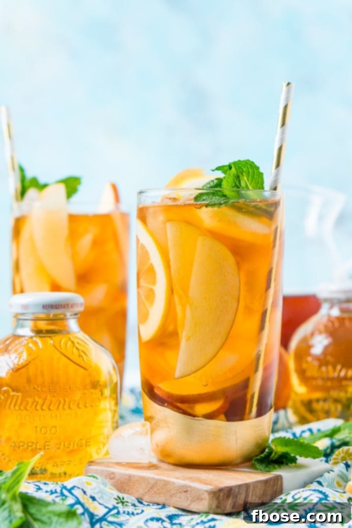 Crisp Apple Iced Tea 2 This Homemade Apple Iced Tea is made with freshly brewed black tea, sweet apple juice, fresh apple slices, and a squeeze of lemon for a refreshing summer drink that's easy to make. This flavored iced tea is naturally sweetened by the fruit juice and great for a party!
