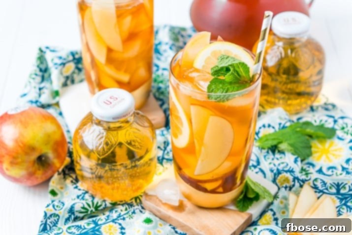 Crisp Apple Iced Tea 4 This Homemade Apple Iced Tea is made with freshly brewed black tea, sweet apple juice, fresh apple slices, and a squeeze of lemon for a refreshing summer drink that's easy to make. This flavored iced tea is naturally sweetened by the fruit juice and great for a party!