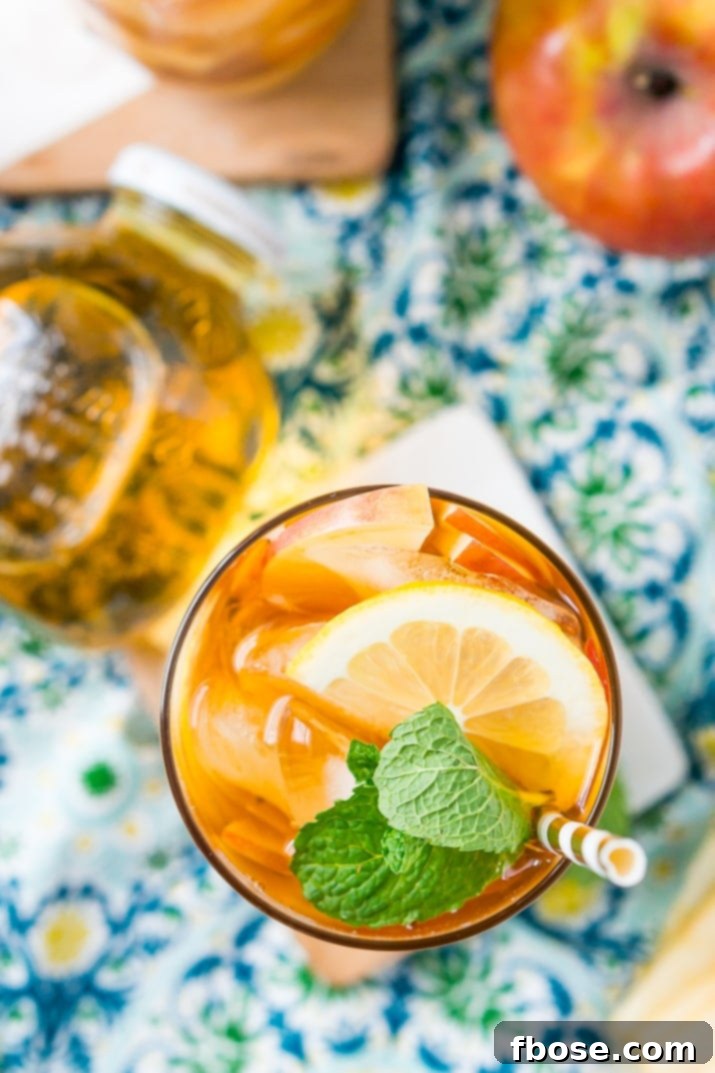 Crisp Apple Iced Tea 5 This Homemade Apple Iced Tea is made with freshly brewed black tea, sweet apple juice, fresh apple slices, and a squeeze of lemon for a refreshing summer drink that's easy to make. This flavored iced tea is naturally sweetened by the fruit juice and great for a party!