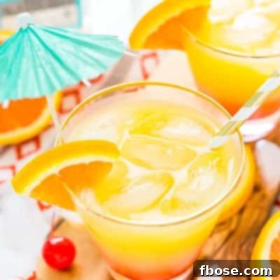The Tequila Sunrise, an easy, classic cocktail with orange juice, tequila, and grenadine, perfect for summer.