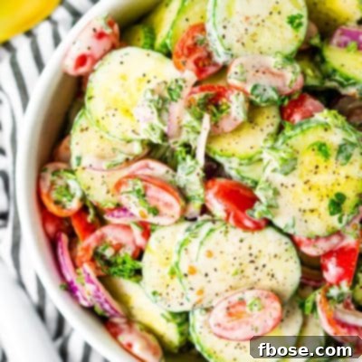 Delicious Cucumber Tomato Salad with creamy or vinegar dressing option.
