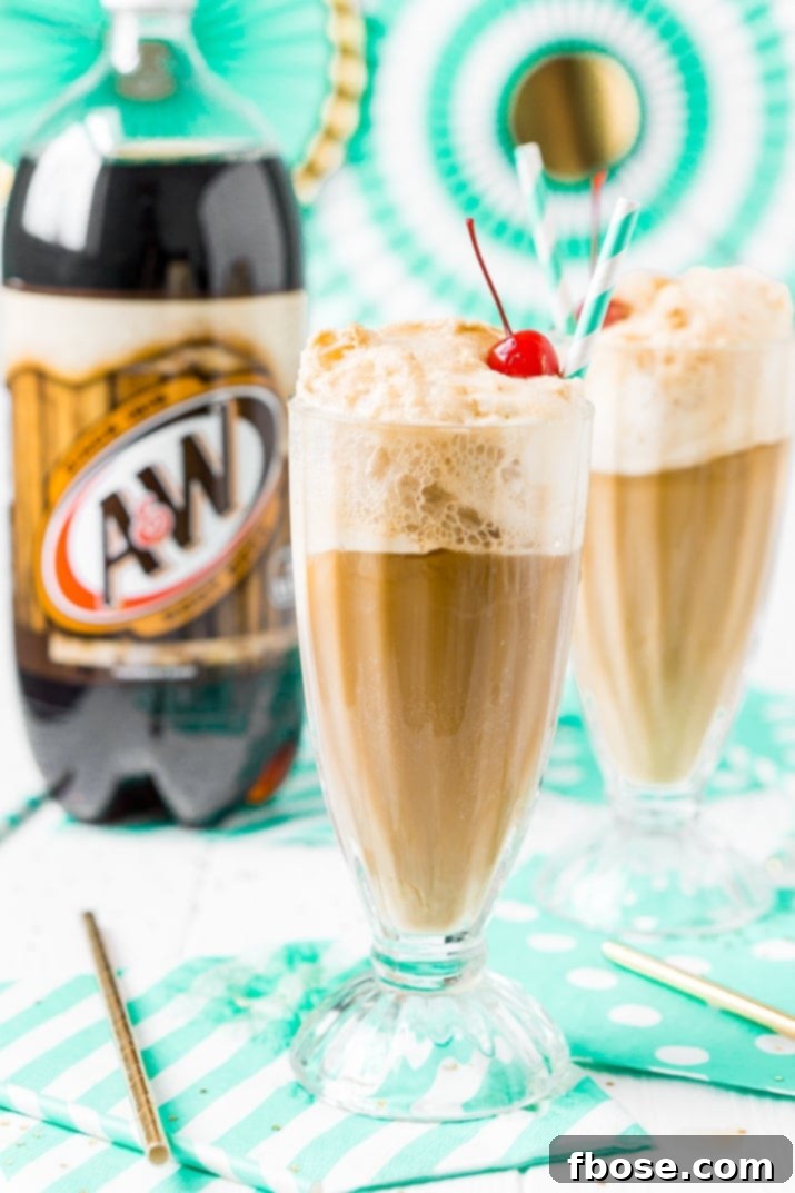 A pristine, empty tall glass, perfectly chilled and ready to be filled with the ingredients for the best A&W Root Beer Float.