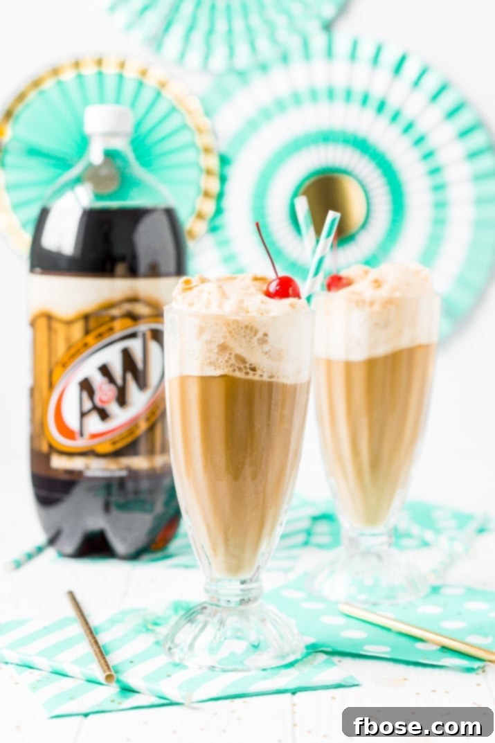 A beautifully arranged Root Beer Float bar, featuring bottles of A&W root beer, ice cream, whipped cream, and cherries, inviting guests to create their own custom floats.