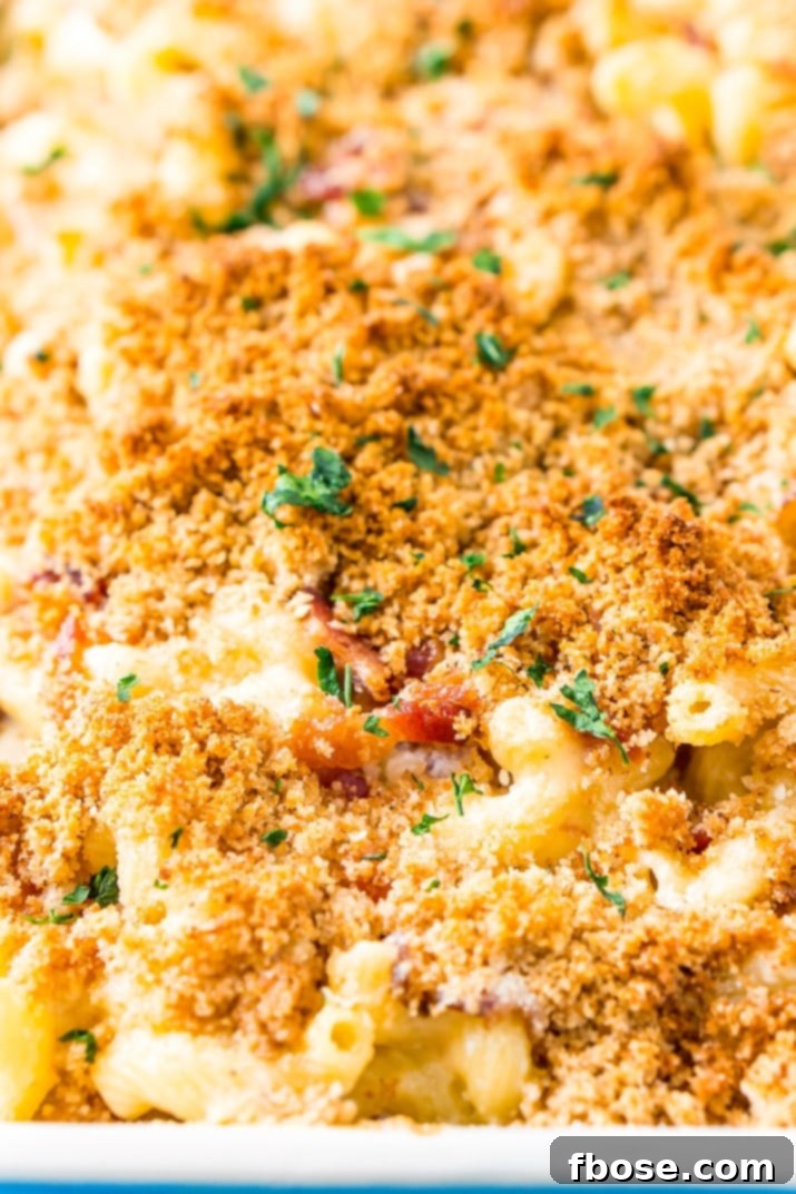 Loaded Bacon Triple Cheese Mac 4 This Three Cheese Bacon Mac and Cheese is loaded up with crispy baked bacon and three different kinds of cheese, it's to die for!