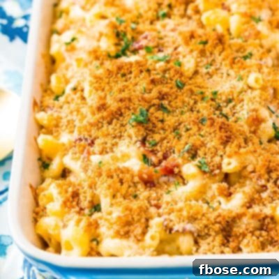 Loaded Bacon Triple Cheese Mac 7 This Three Cheese Bacon Mac and Cheese is loaded up with crispy baked bacon and three different kinds of cheese, it's to die for!