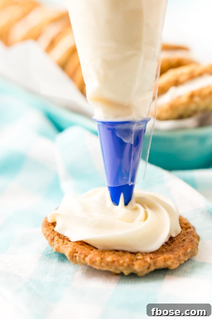 These Oatmeal Cream Pies are soft and chewy just like the ones you grew up with. Sweet oatmeal cookies sandwich a creamy vanilla filling for an easy and delicious dessert!