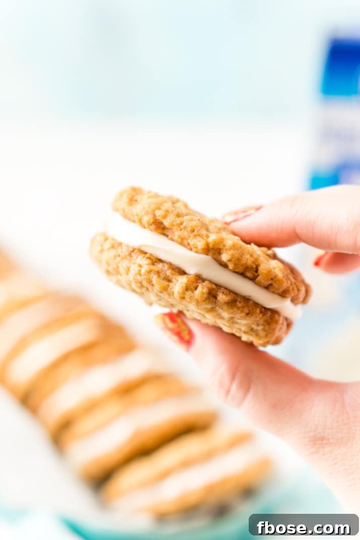 These Oatmeal Cream Pies are soft and chewy just like the ones you grew up with. Sweet oatmeal cookies sandwich a creamy vanilla filling for an easy and delicious dessert!